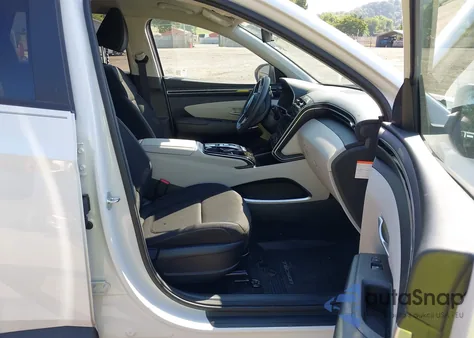 2024 Hyundai Tucson Hybrid Blue z USA, uszkodzony, nr VIN KM8JBCD15RU210906